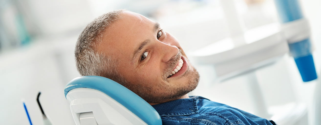 man at the dentist